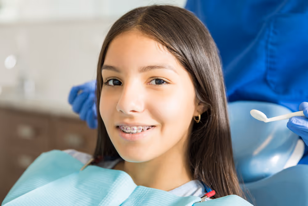 Patient smiling with braces